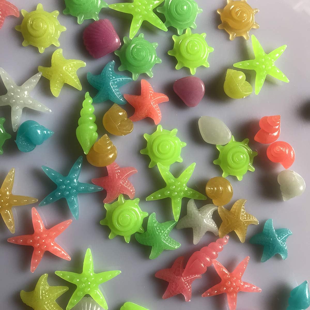 Oubest Glow in The Dark Pebbles/Glow Stones/Glowing Rocks Blue Decor for Garden/Fish Tank/Aquarium/Walkway/Driveway/Plant Pots/Bonsai (100, Starfish)