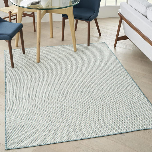 Nourison Home Courtyard 60" x 84" Fabric Indoor/Outdoor Rug in Ivory Aqua